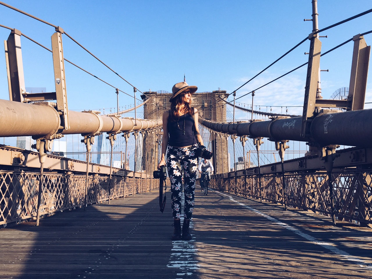 cadence feeley on the brooklyn bridge, new york city