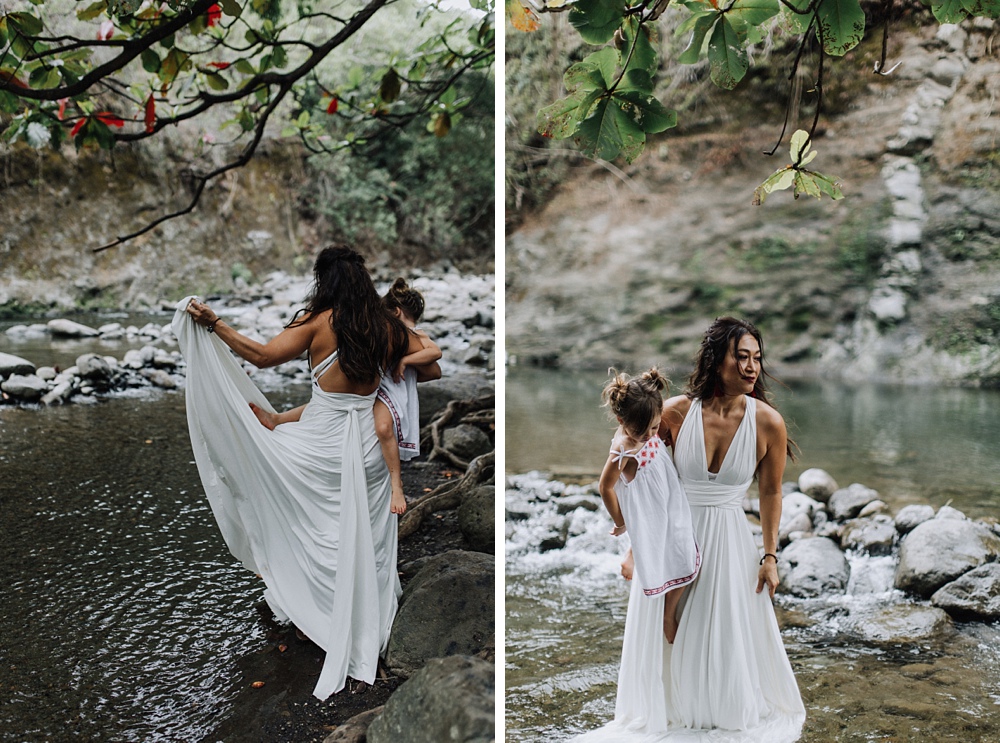 maui photographer takes photos at iao valley for family portraits in maui, hawaii. 