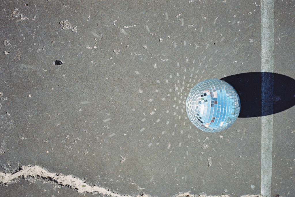 photo of a disco ball on basketball court
