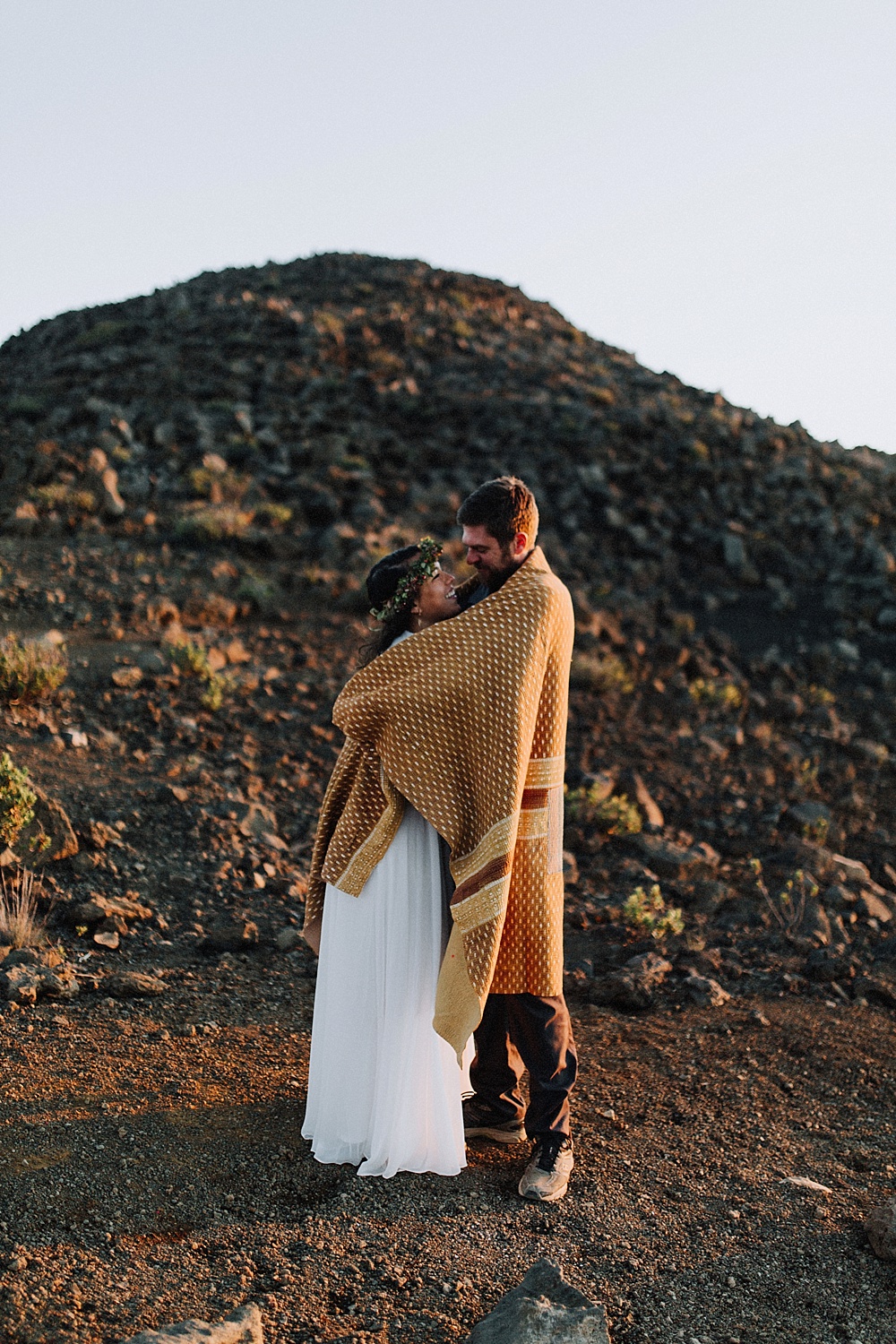 Wrapped up in Vintage Kantha Maui at sunrise at the top of Haleakala for an intimate elopement. 
