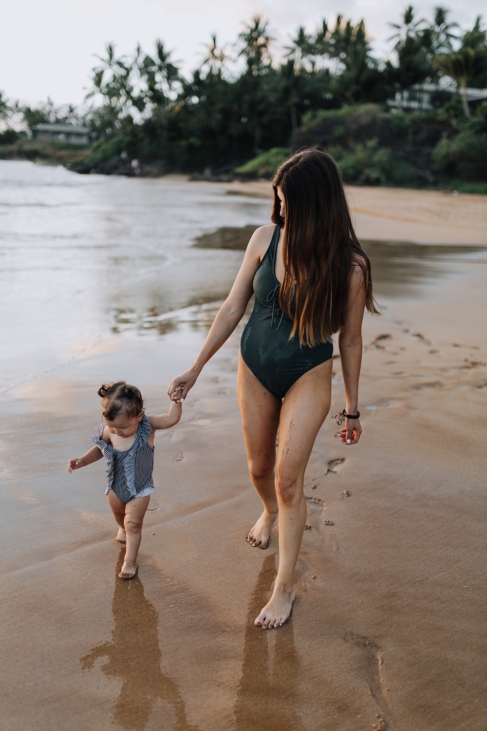 mothoer and daughter in swimwear during their family session