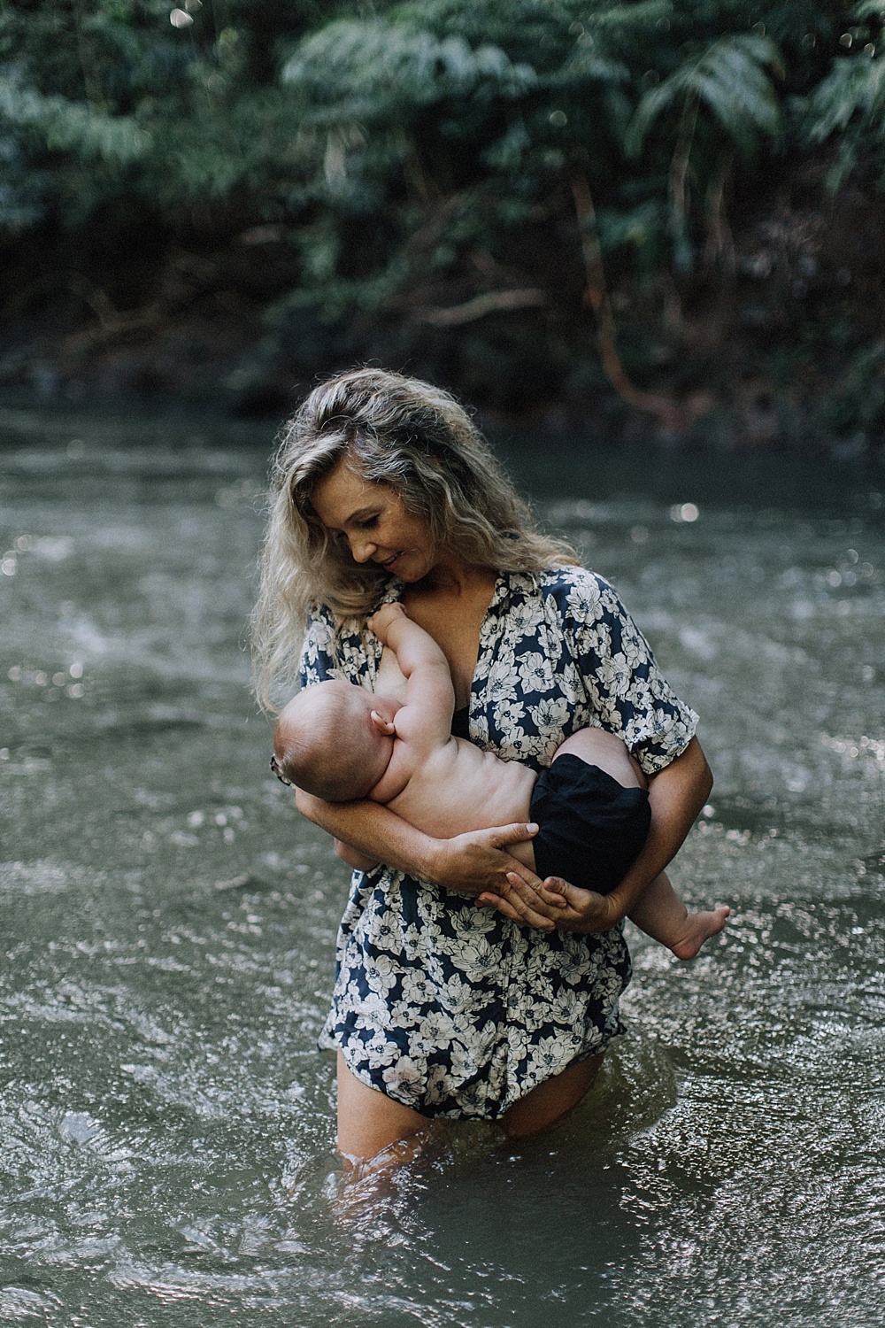 breastfeeding at the waterfall on maui