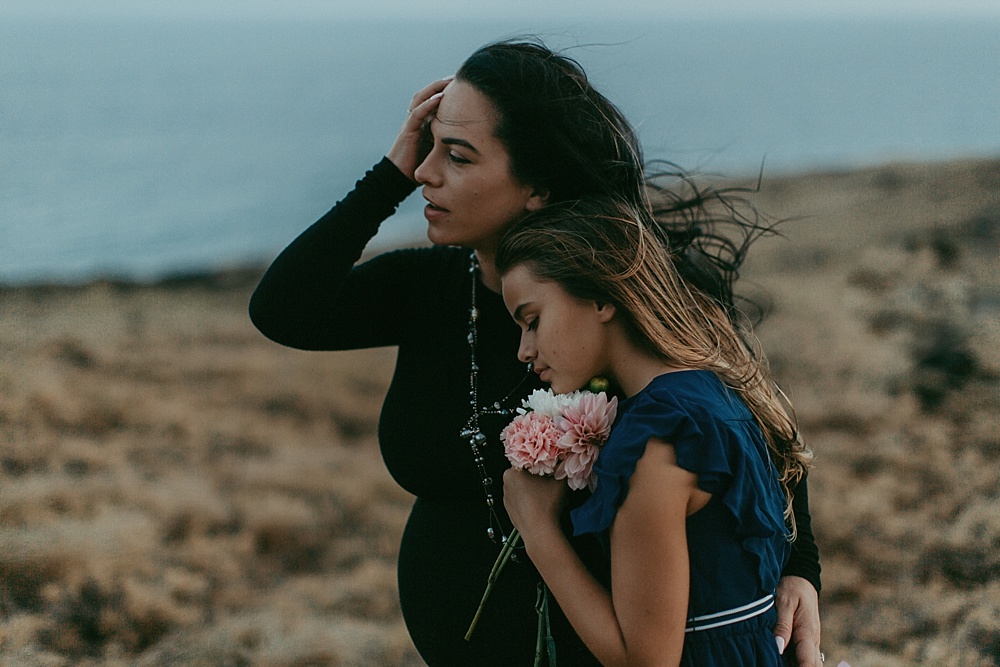 mother and daughter during adventurous family photography session in hawaii. 