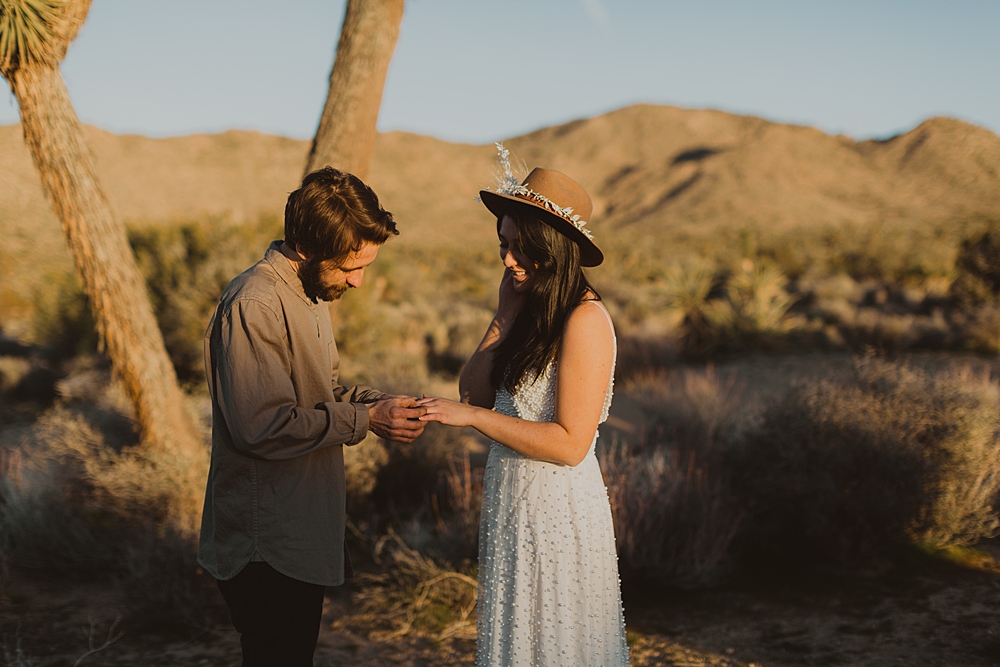 Couple exchanging vows in Twentynine Palms, California.