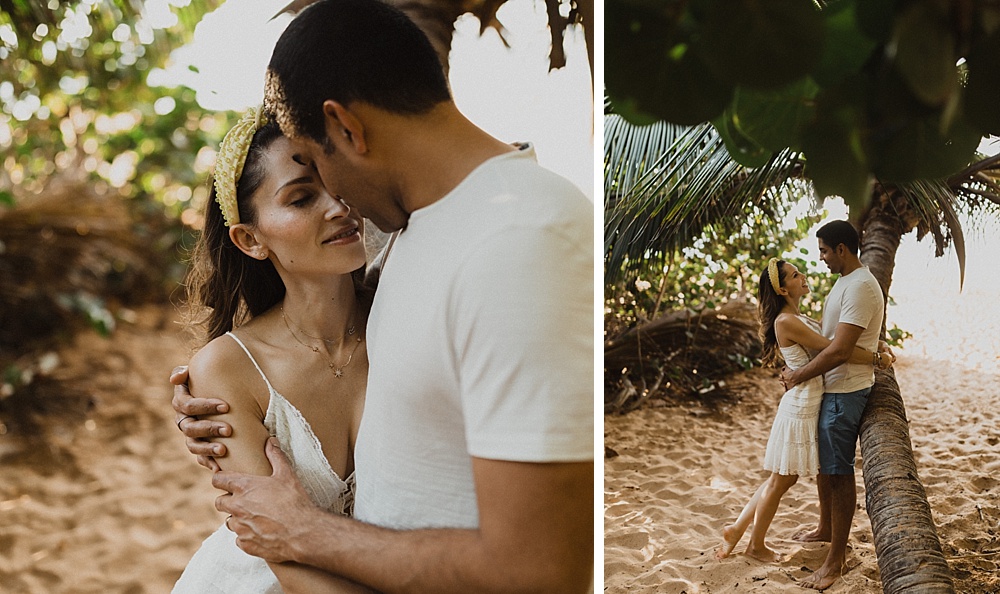 couples under coconut tree during photos on maui 